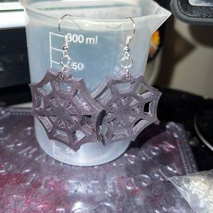 Purple resin spider web earrings